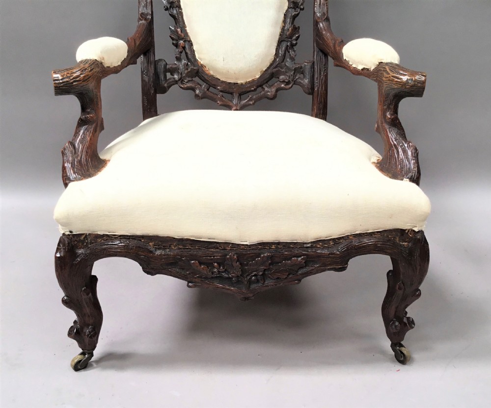 C19th pair of Black Forest open armchairs View XIV