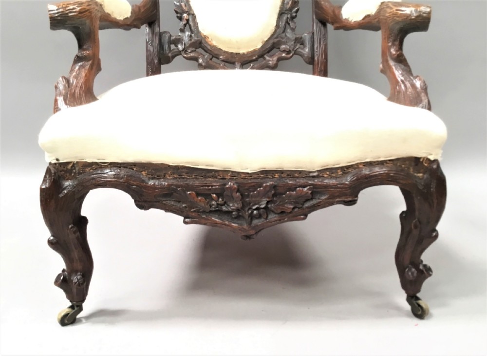 C19th pair of Black Forest open armchairs View XV