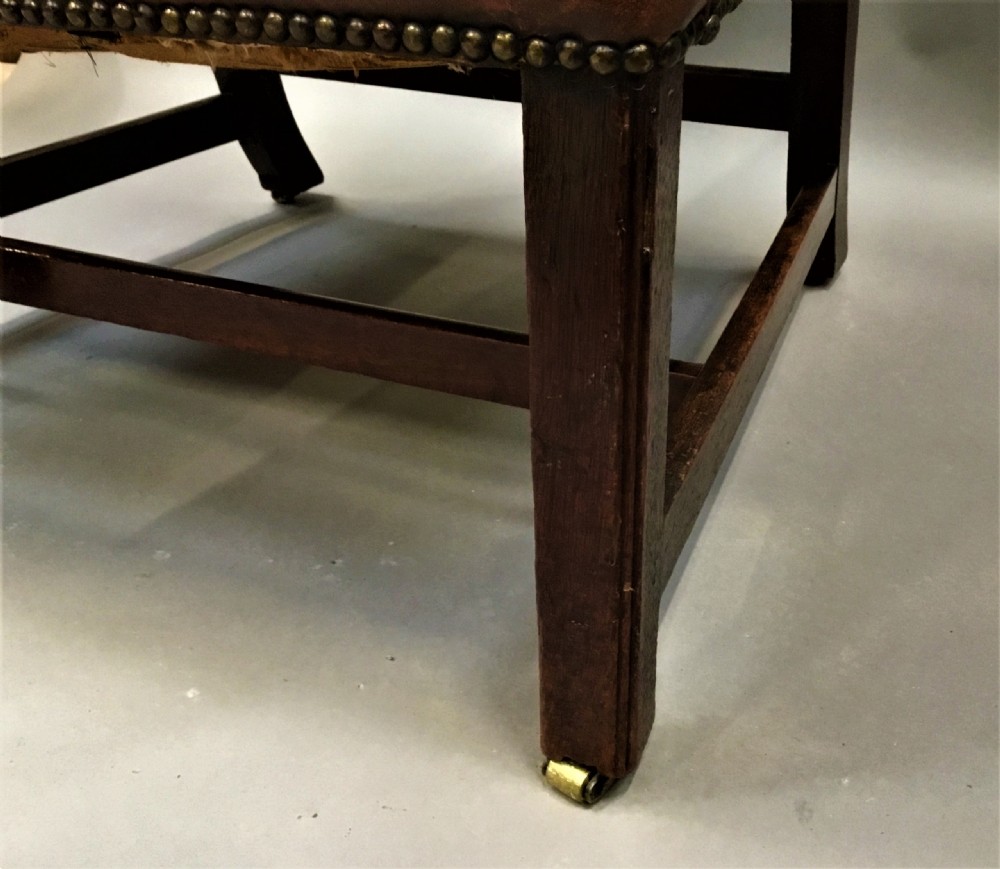 George III mahogany and leather wing chair of generous proportions View IX