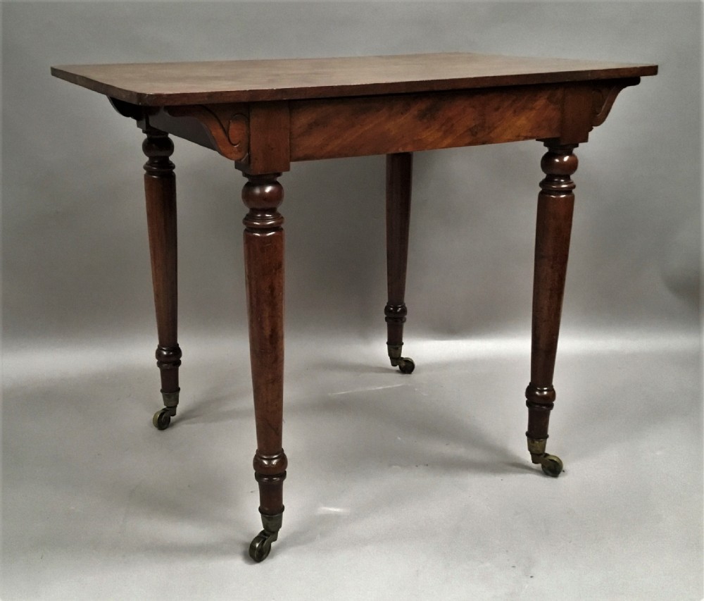C19th mahogany side table / writing table by Holland and Sons, London