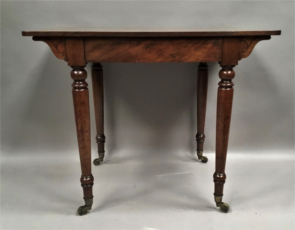C19th mahogany side table / writing table by Holland and Sons, London View II