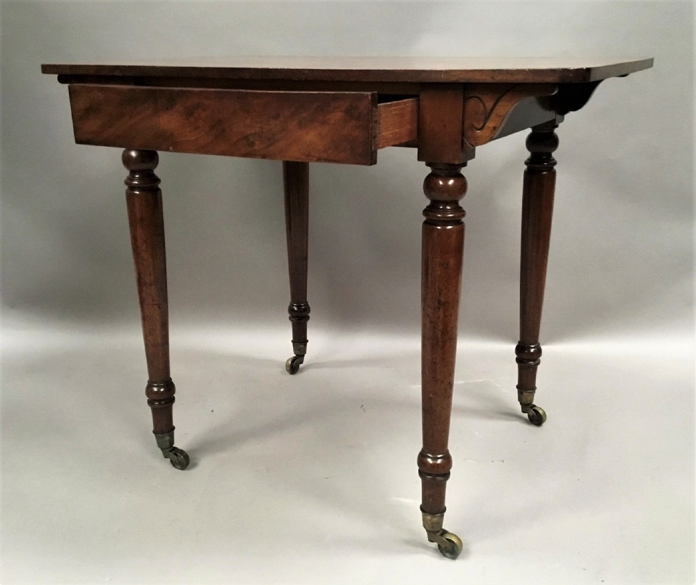 C19th mahogany side table / writing table by Holland and Sons, London View V