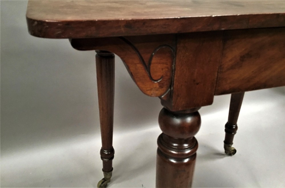 C19th mahogany side table / writing table by Holland and Sons, London View XIII