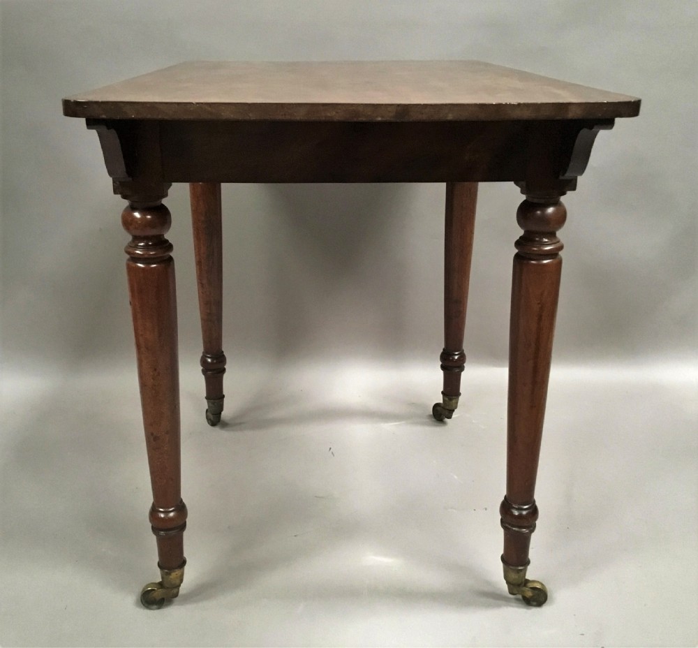 C19th mahogany side table / writing table by Holland and Sons, London View XIV