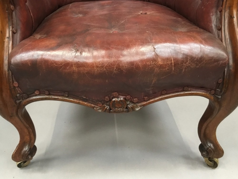 C19th walnut and leather library armchair View XI