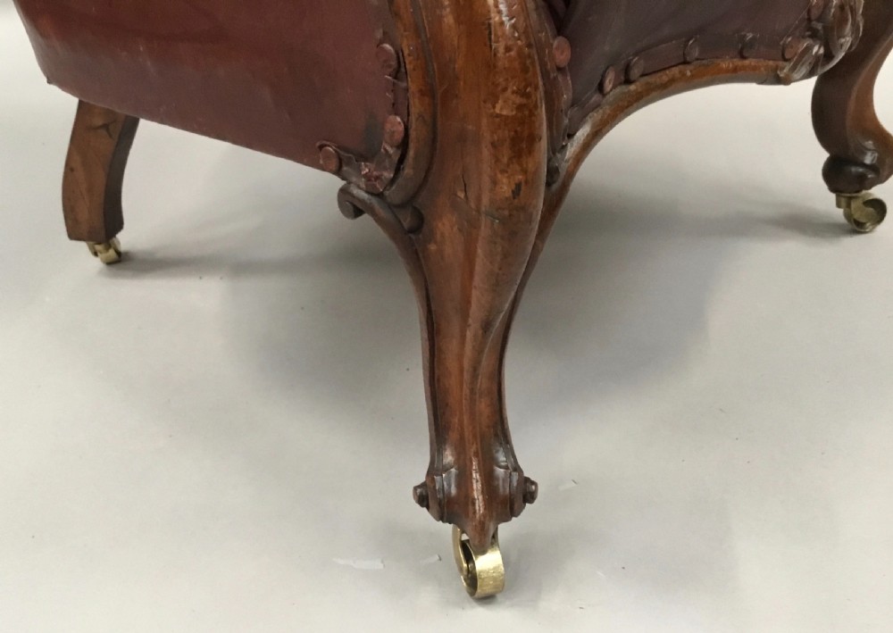 C19th walnut and leather library armchair View XVII
