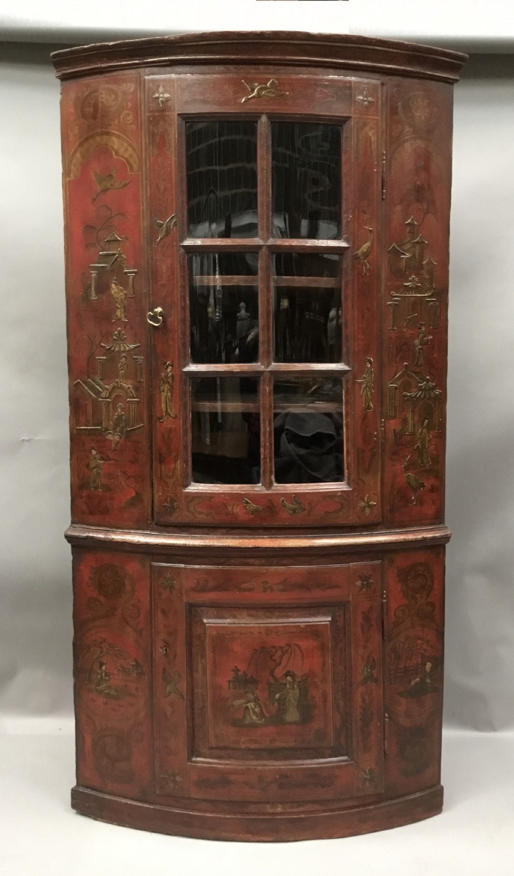 C18th red lacquered Chinoiserie standing corner cupboard