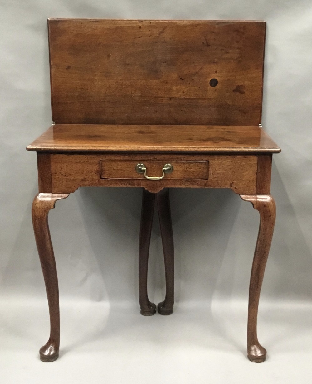 George II walnut foldover top tea table