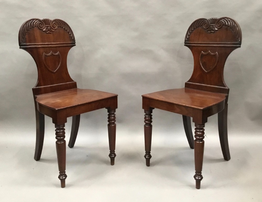 Regency pair of mahogany hall chairs View V