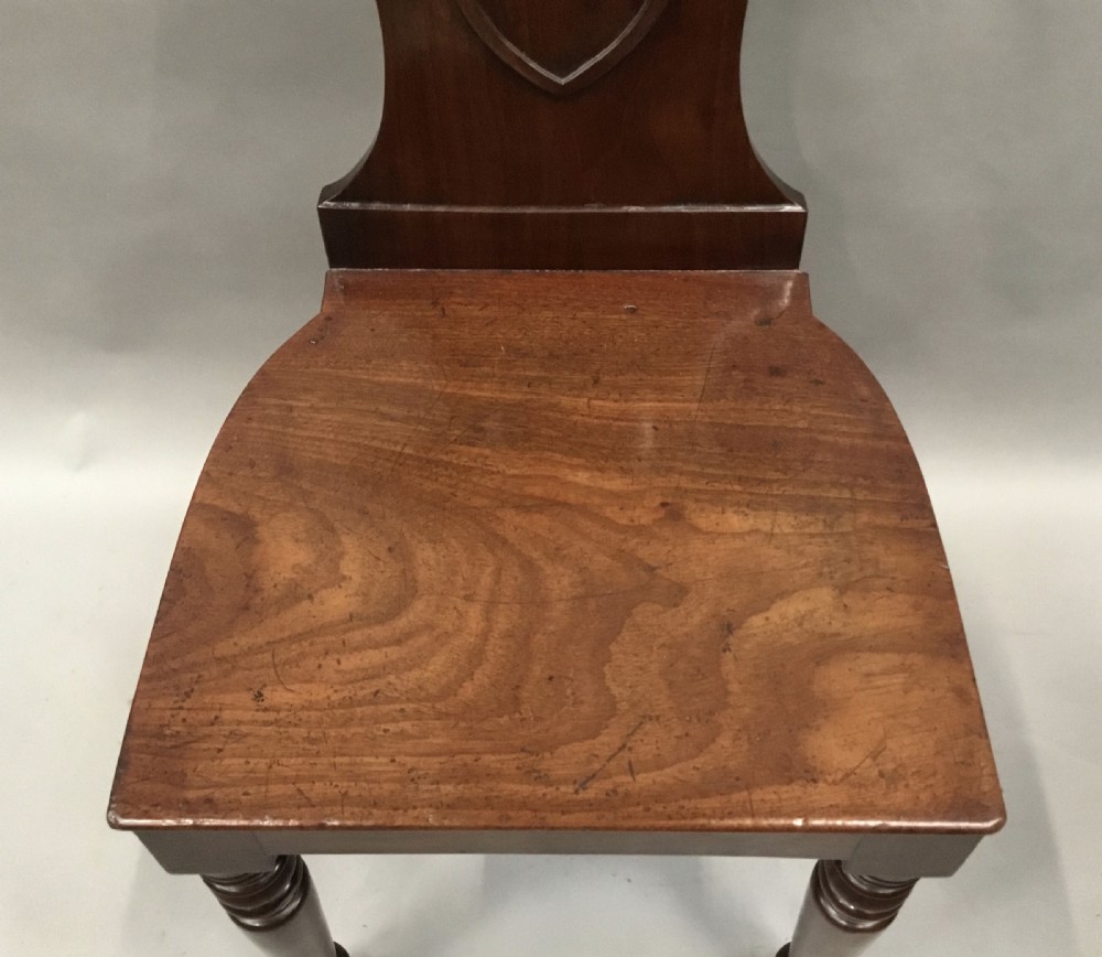 Regency pair of mahogany hall chairs View XII