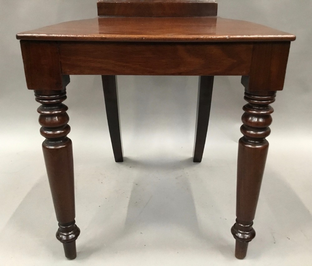 Regency pair of mahogany hall chairs View XVII