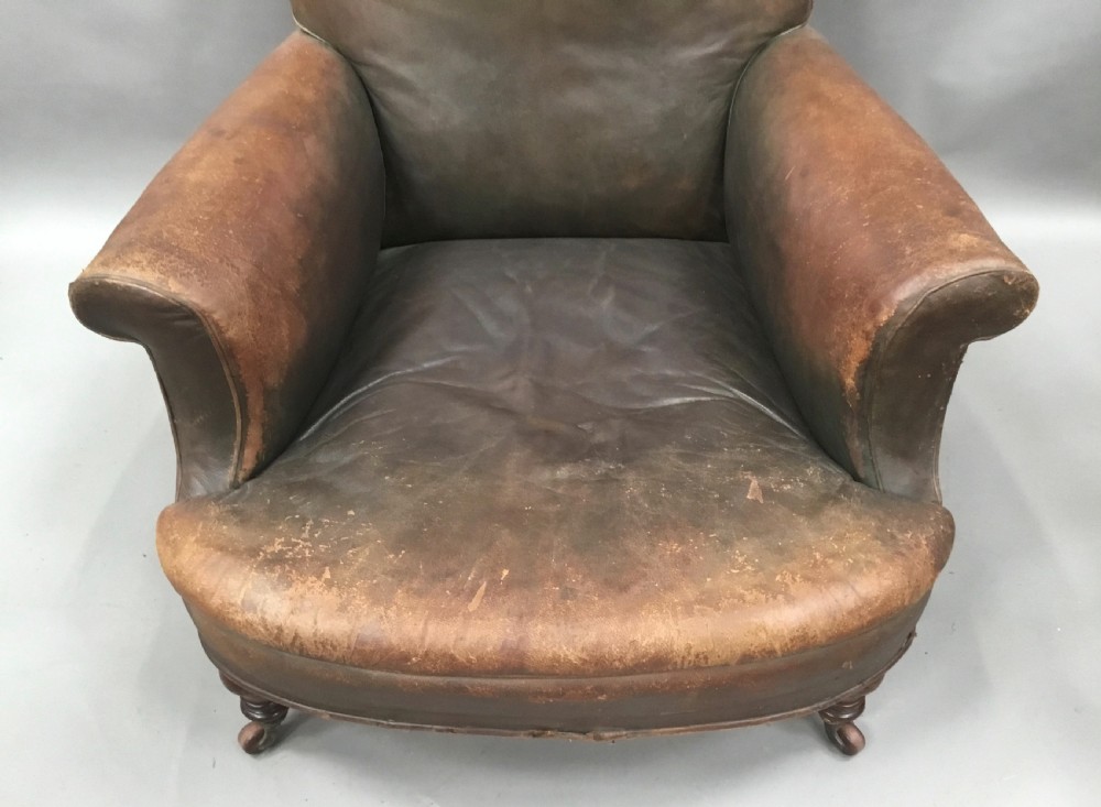  C19th large upholstered armchair in original leather of the Howard style View XIV
