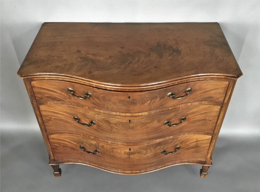 George III Hepplewhite mahogany serpentine dressing chest of drawers View II