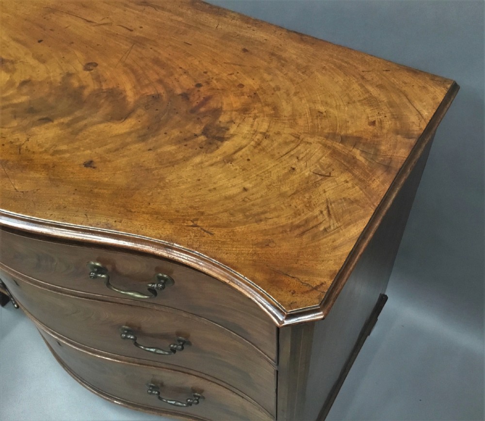 George III Hepplewhite mahogany serpentine dressing chest of drawers View III