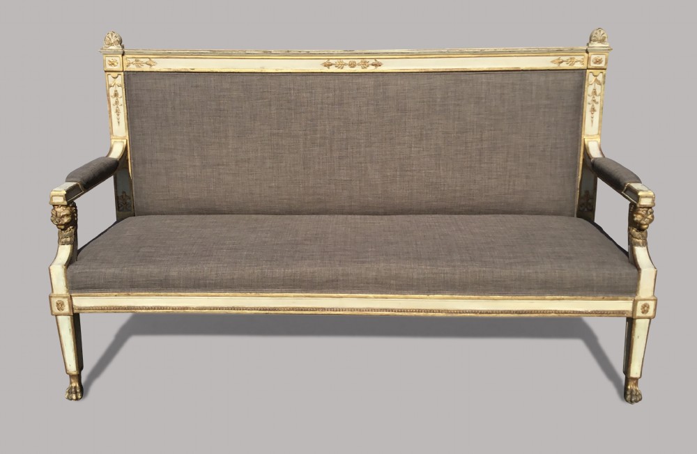 A 19th-century Italian Neoclassical cream painted and giltwood settee upholstered in neutral grey linen fabric. View III