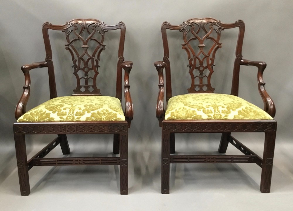 C19th pair of carved mahogany open armchairs in the Chippendale manner