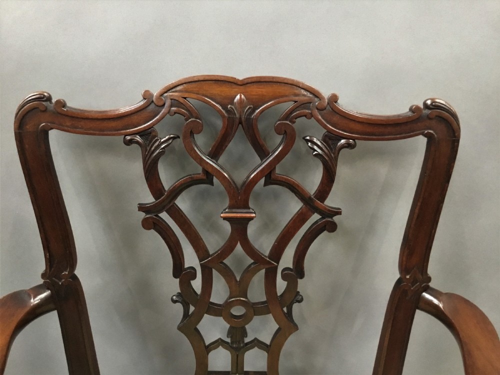 C19th pair of carved mahogany open armchairs in the Chippendale manner View XV