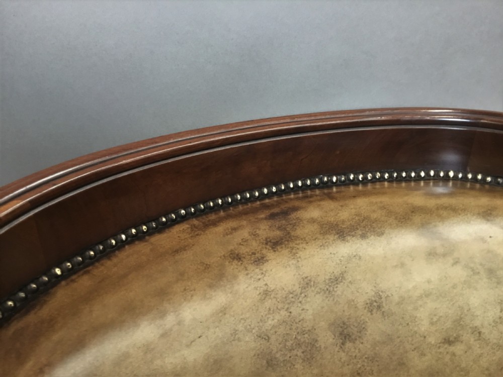 Exceptional C19th mahogany leather library armchair View XXI