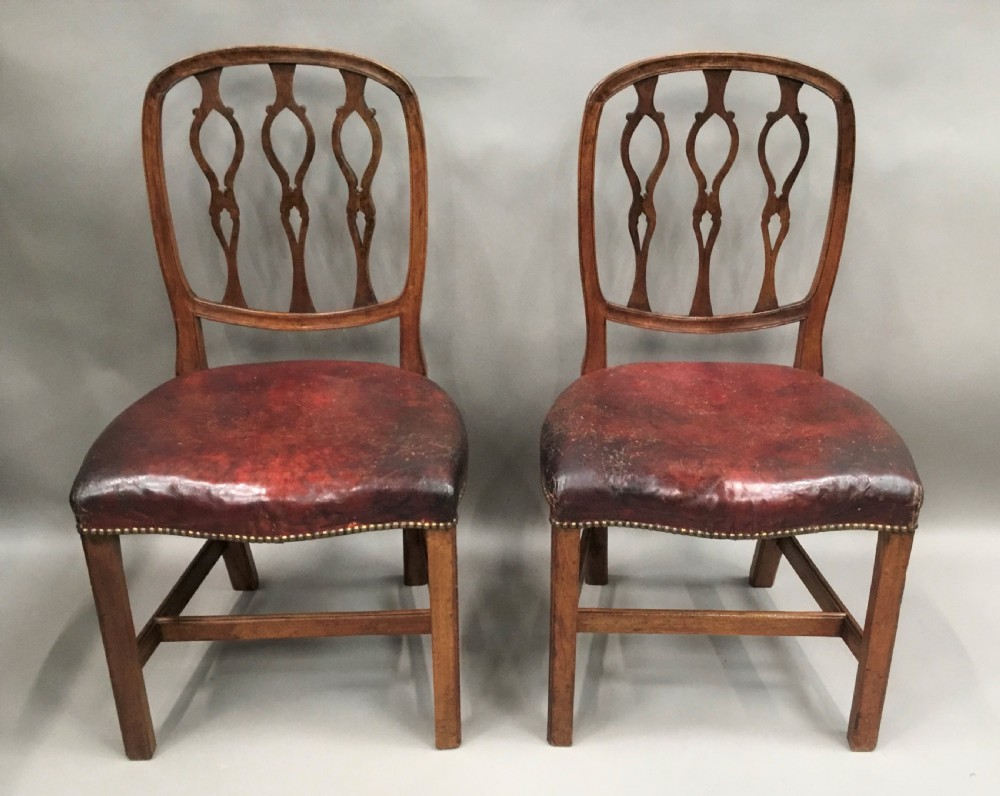 George III pair of mahogany and leather side chairs View V