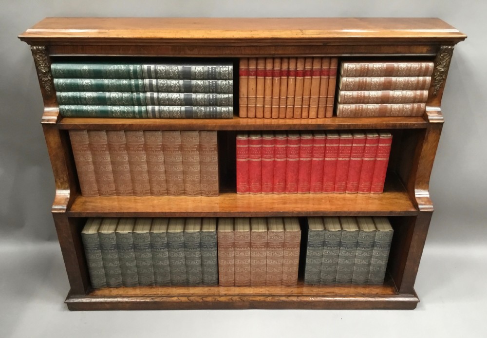 Mid C19th walnut waterfall open bookcase of neat proportions View III