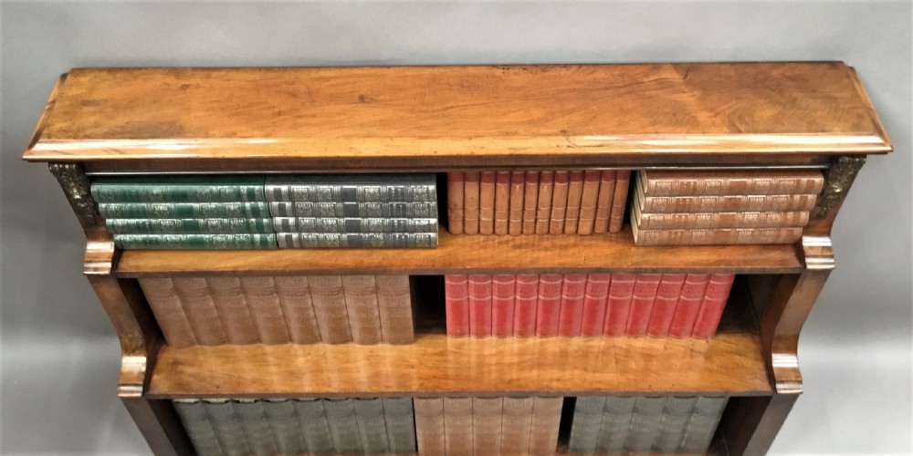 Mid C19th walnut waterfall open bookcase of neat proportions View VI