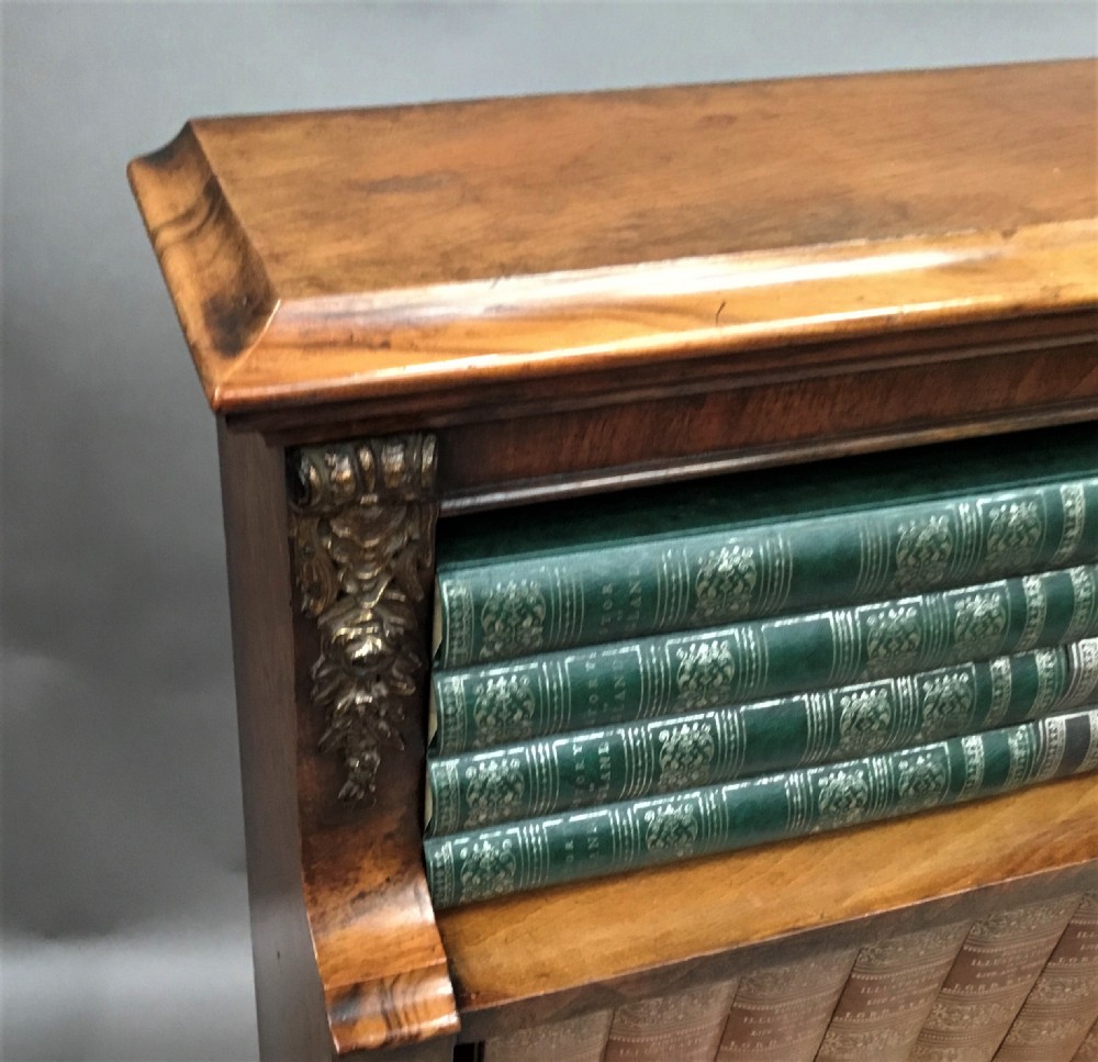 Mid C19th walnut waterfall open bookcase of neat proportions View XI