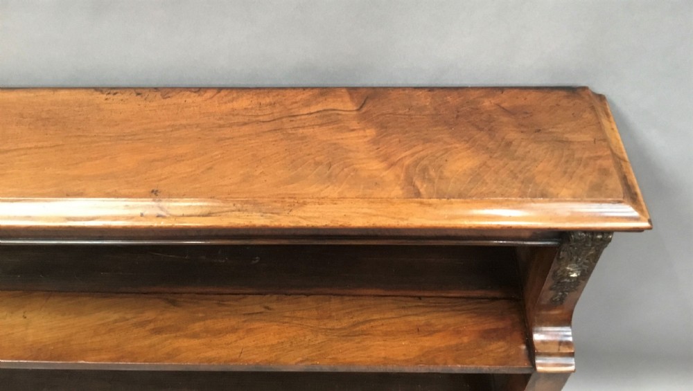 Mid C19th walnut waterfall open bookcase of neat proportions View XII