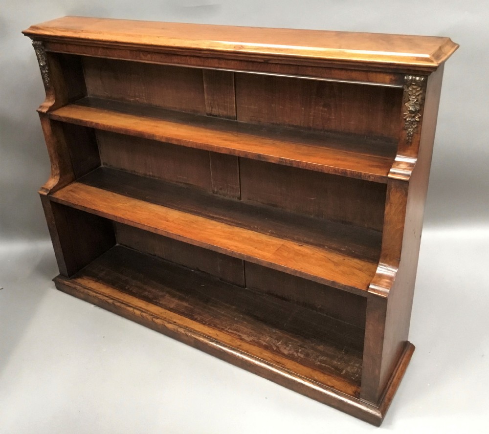 Mid C19th walnut waterfall open bookcase of neat proportions View XV