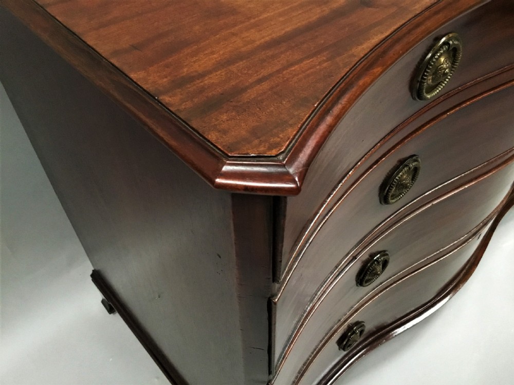 George III mahogany serpentine chest of drawers View IV