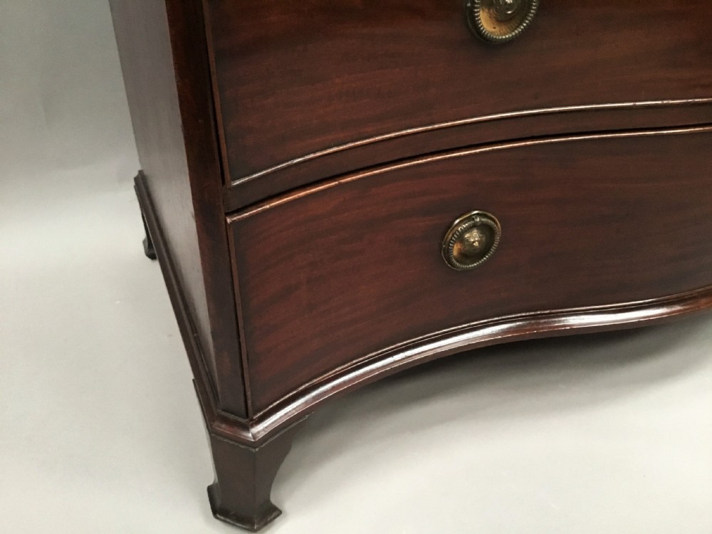 George III mahogany serpentine chest of drawers View V