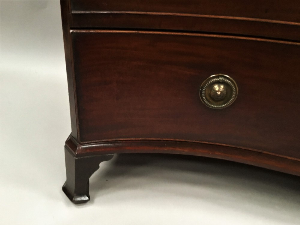 George III mahogany serpentine chest of drawers View VII