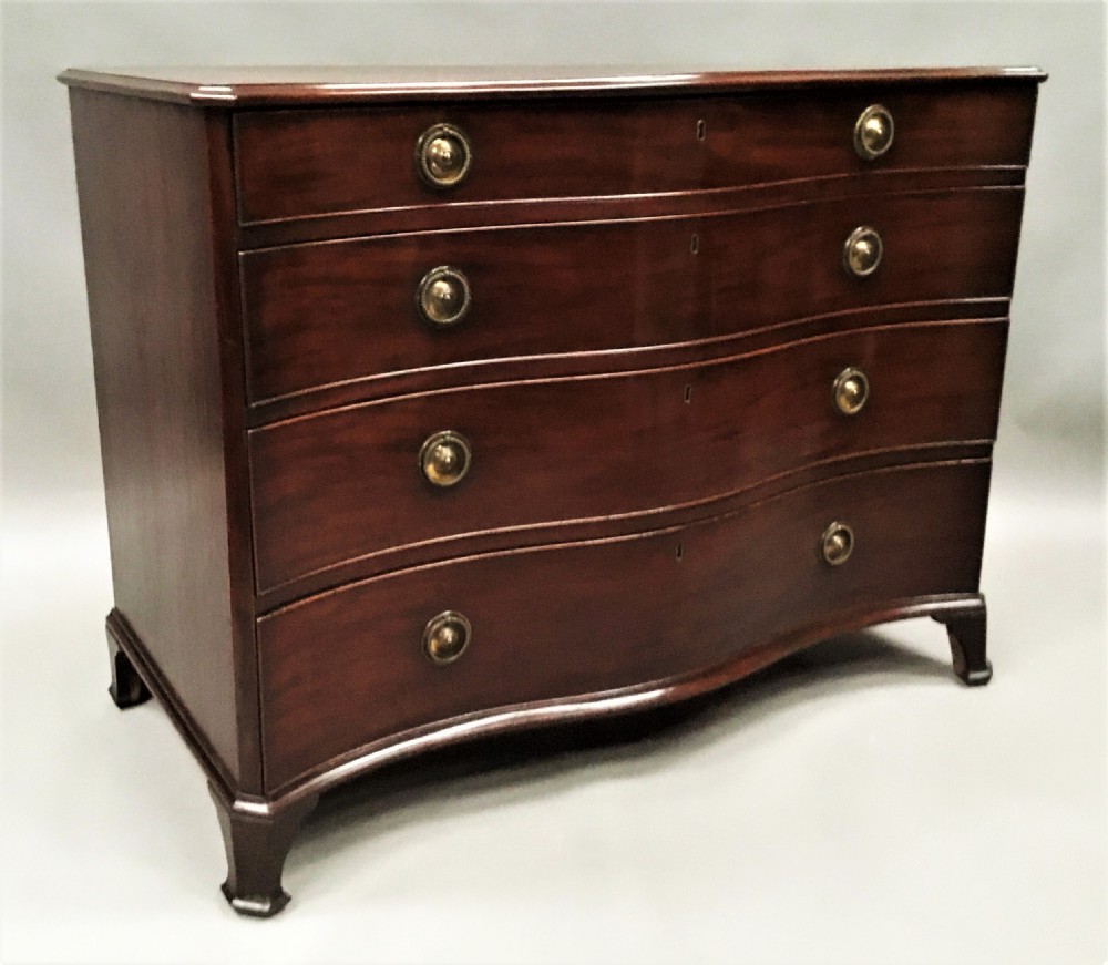 George III mahogany serpentine chest of drawers View XI
