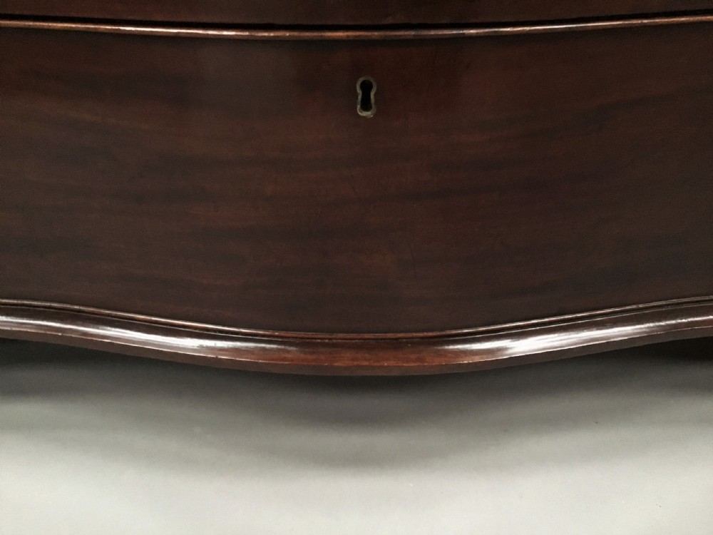 George III mahogany serpentine chest of drawers View XIX