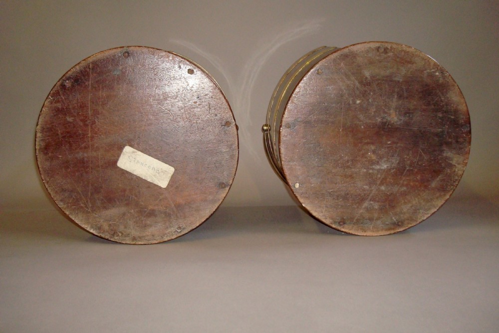 A pair of 18th-century mahogany plate buckets featuring brass binding straps, swing handles, and a vertical front cutout. View II