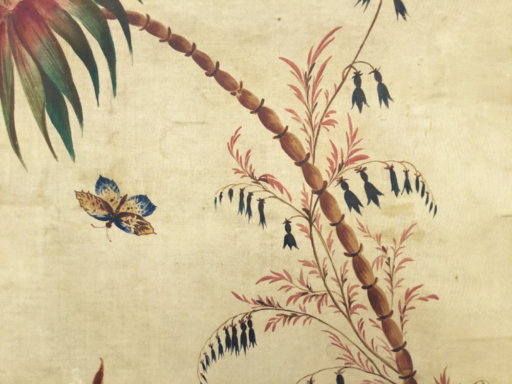 A nineteenth-century oil painting on canvas depicting a floral arrangement in a classical urn, exotic birds, and a palm tree behind a stone balustrade, set within a dark wooden frame with a gold slip. View III