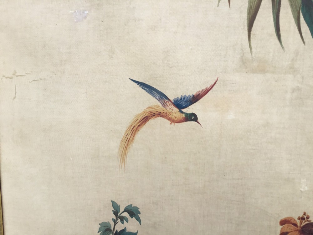 A nineteenth-century oil painting on canvas depicting a floral arrangement in a classical urn, exotic birds, and a palm tree behind a stone balustrade, set within a dark wooden frame with a gold slip. View XI