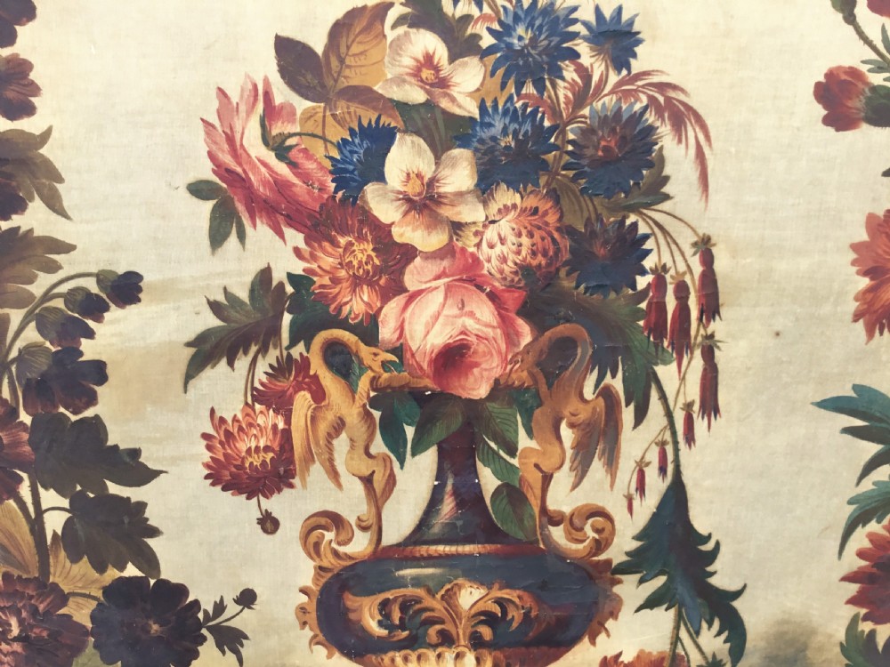 A nineteenth-century oil painting on canvas depicting a floral arrangement in a classical urn, exotic birds, and a palm tree behind a stone balustrade, set within a dark wooden frame with a gold slip. View XII