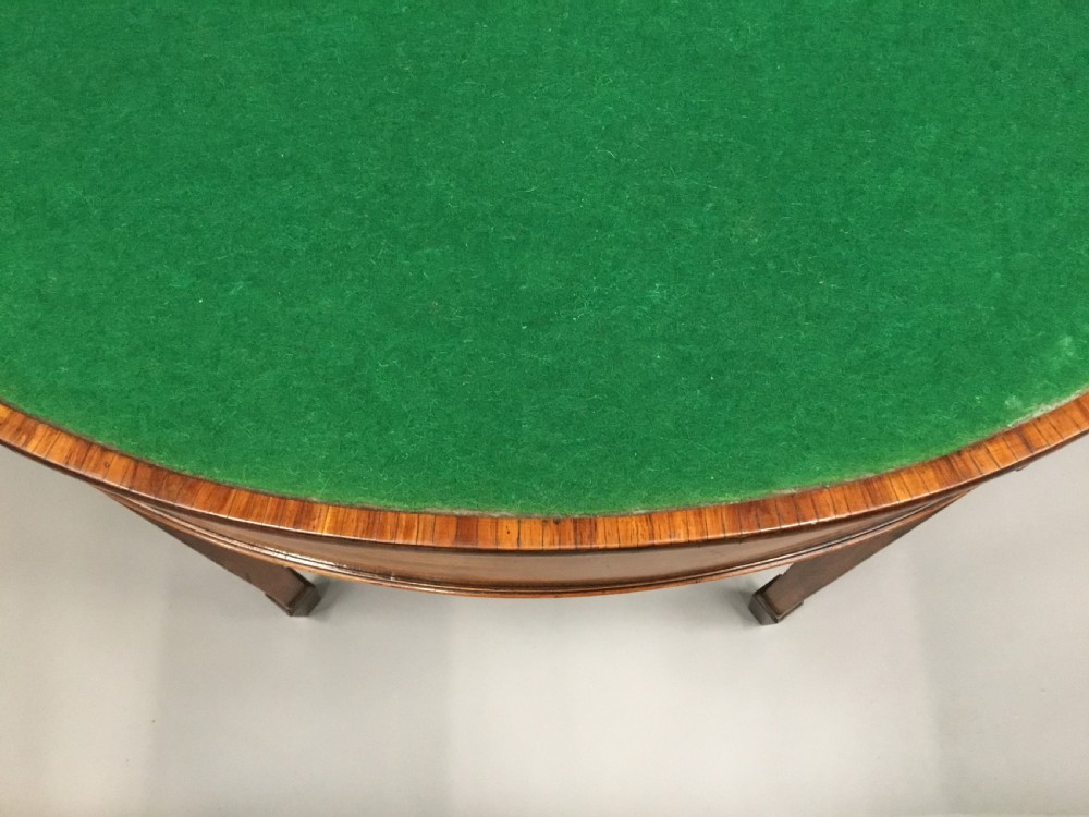 George III Satinwood demilune card table; in the Sheraton manner with an excellent colour View XIII