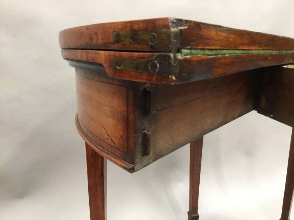 George III Satinwood demilune card table; in the Sheraton manner with an excellent colour View XVI