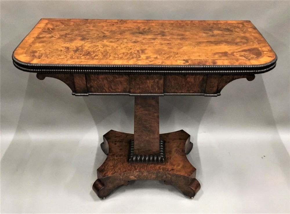 Regency burr yew card table; by the esteemed cabinet maker Robert James