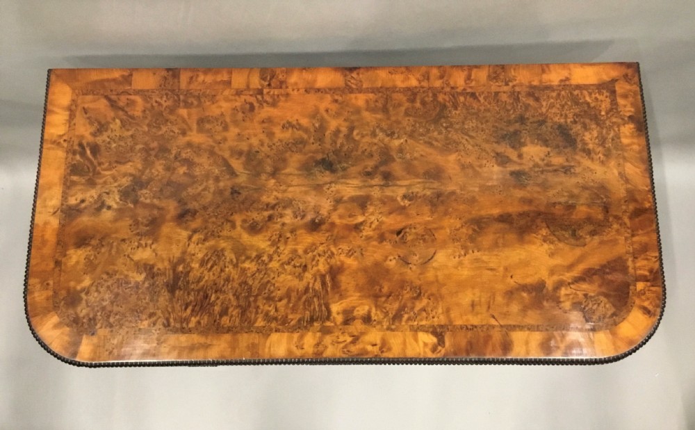 Regency burr yew card table; by the esteemed cabinet maker Robert James View II