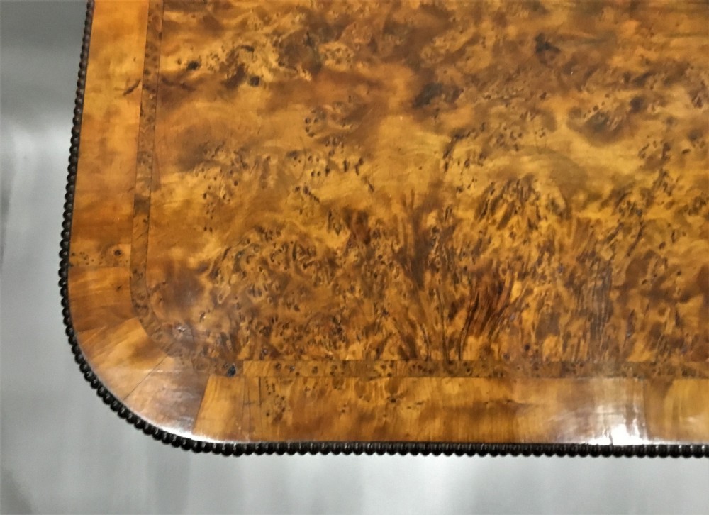 Regency burr yew card table; by the esteemed cabinet maker Robert James View X