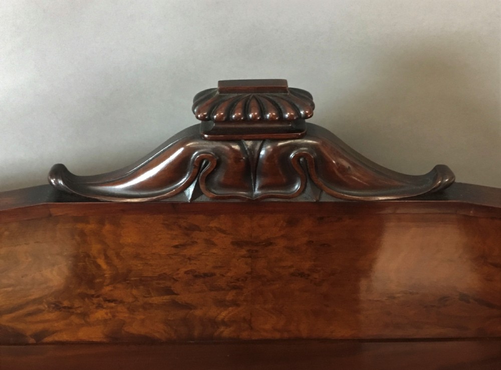 A Regency period dark mahogany serving table featuring carved scroll legs with acanthus leaves, a gadrooned top edge, and a raised carved backrail. View XVIII