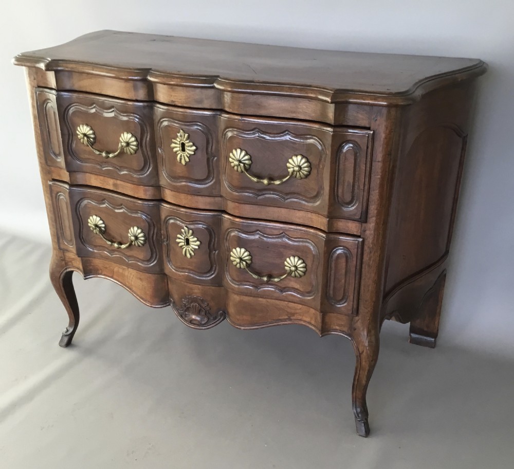 C18th French provincial walnut serpentine commode; of desirable neat proportions View II