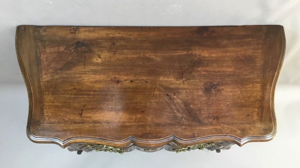 C18th French provincial walnut serpentine commode; of desirable neat proportions View III