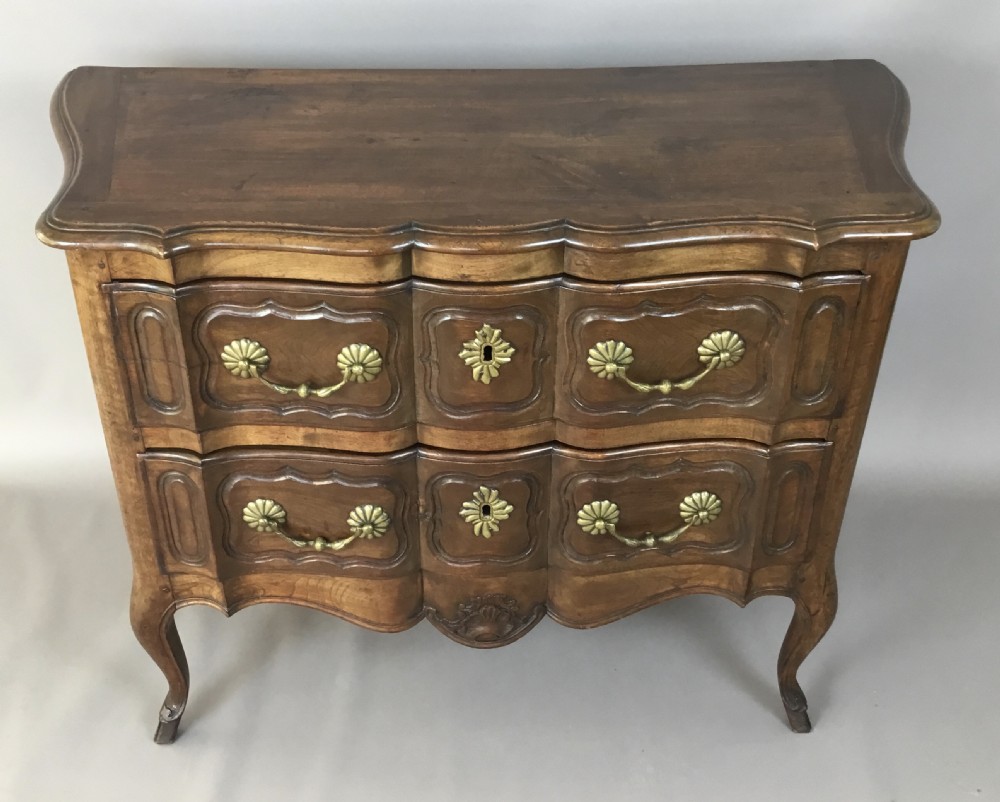 C18th French provincial walnut serpentine commode; of desirable neat proportions View V