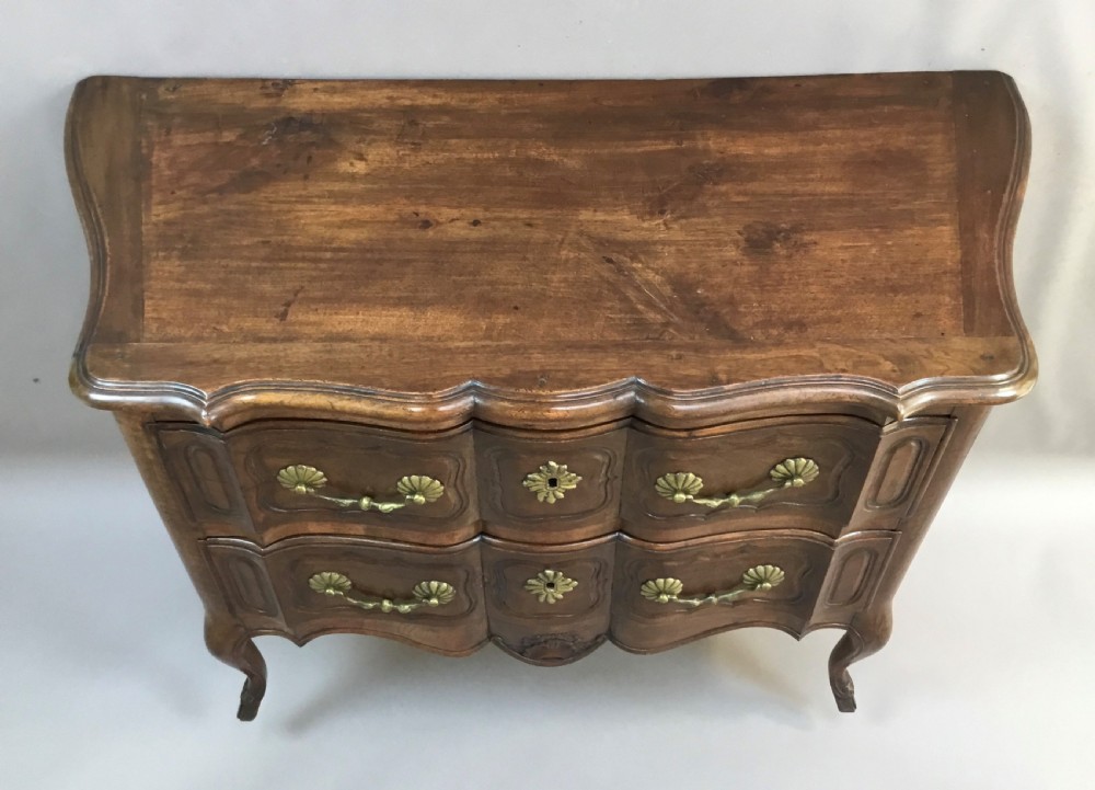 C18th French provincial walnut serpentine commode; of desirable neat proportions View X