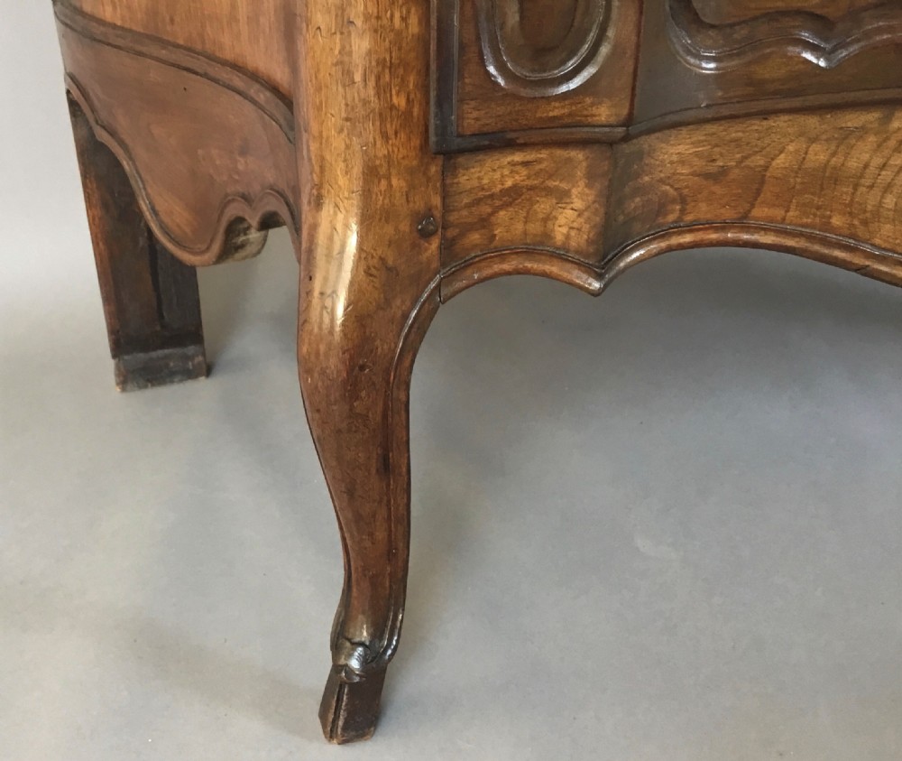 C18th French provincial walnut serpentine commode; of desirable neat proportions View XIII