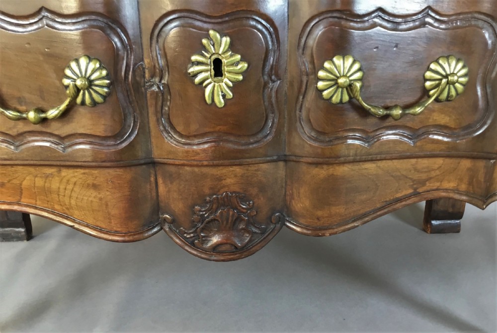 C18th French provincial walnut serpentine commode; of desirable neat proportions View XVII