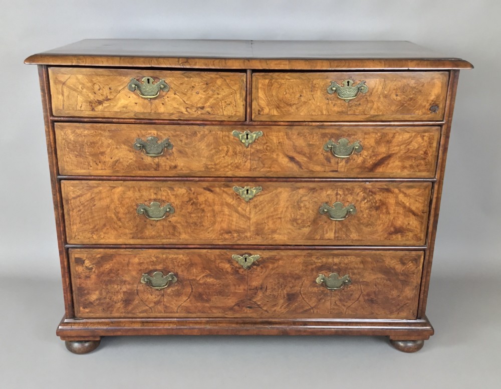 C18th Queen Anne walnut chest of drawers; excellent colour and good proportions View V